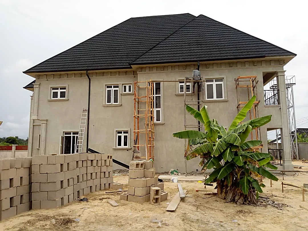 Completed duplex, charcoal stone-coated roof