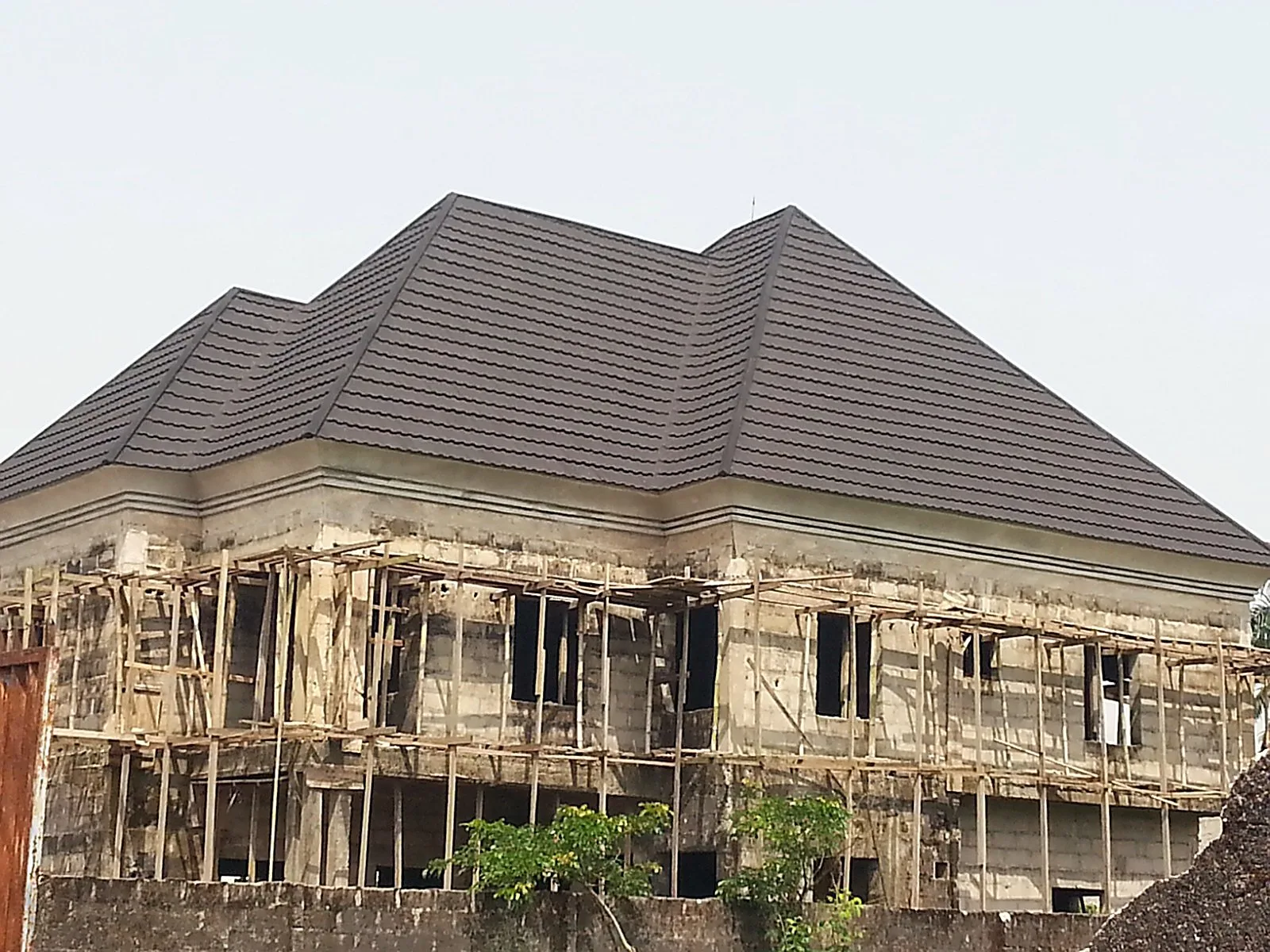 Roof tiling in progress, duplex project