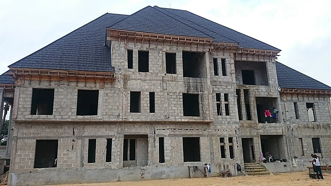 Large duplex block, walls and roof rising